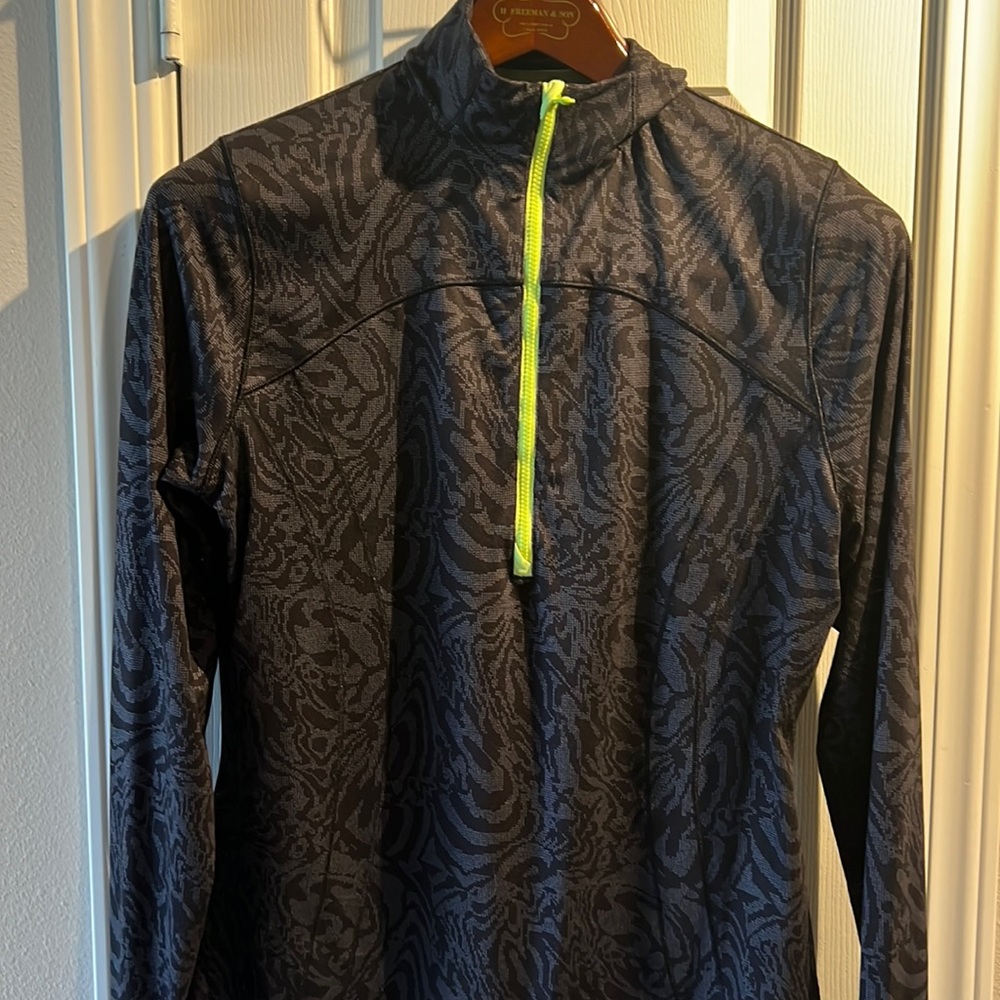Women’s size medium golf jersey dry tech 50+ from Annika cutter and buck